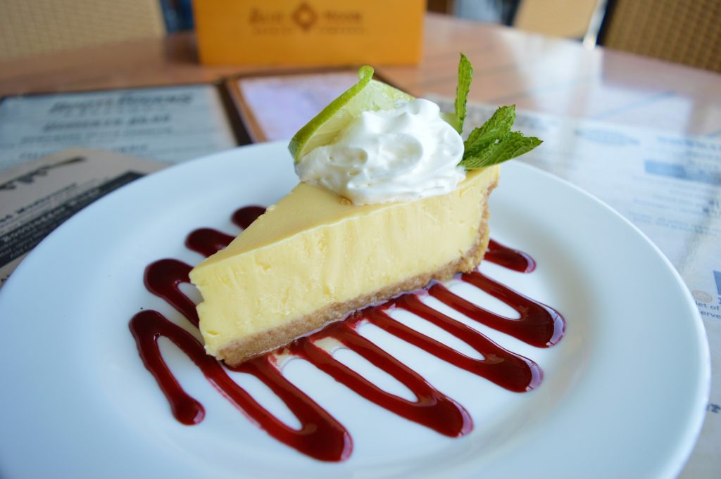 a slice of key lime pie artfully plated
